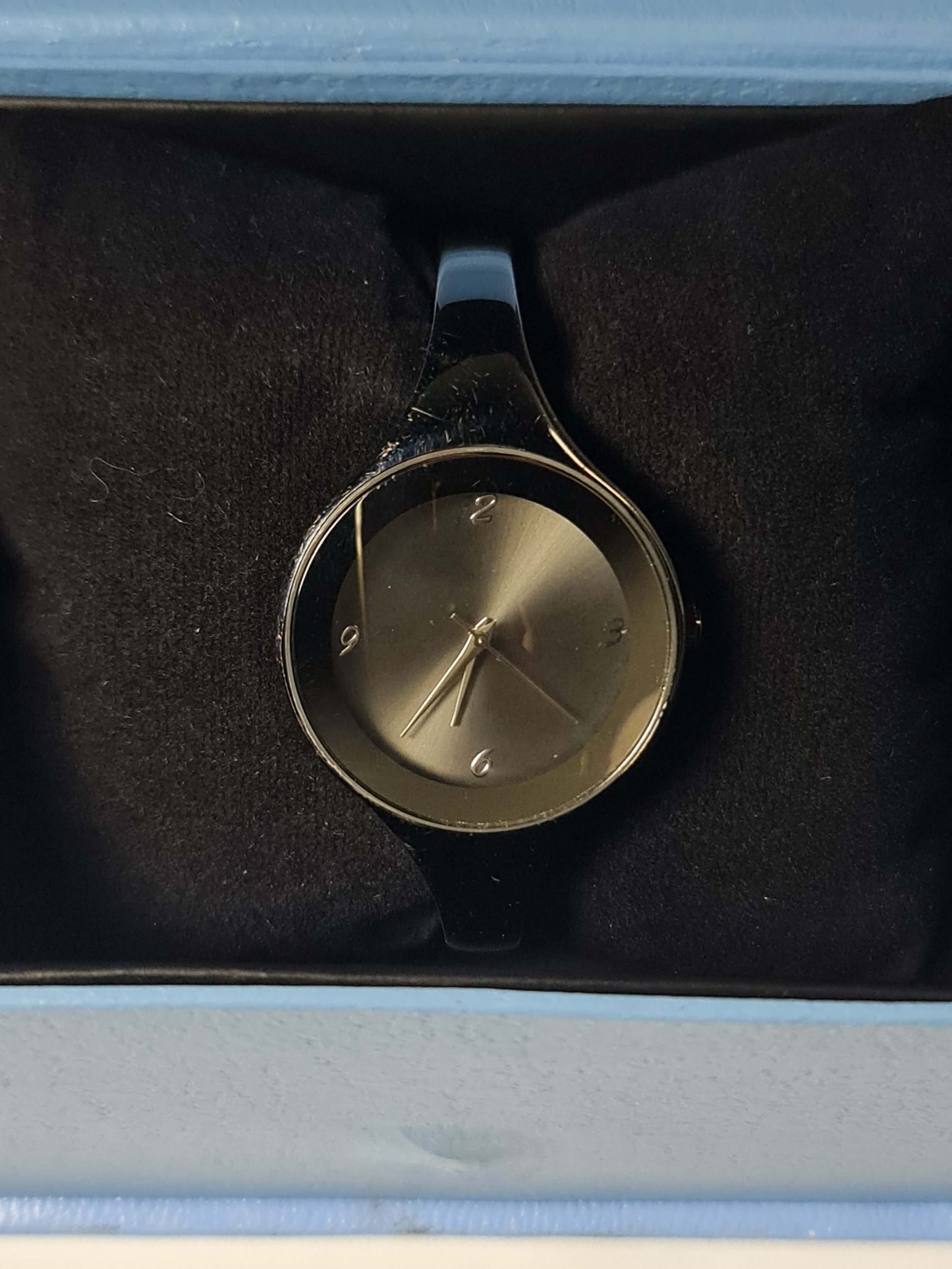 Minimalist Women’s Black Bangle Watch with Sunray Dial